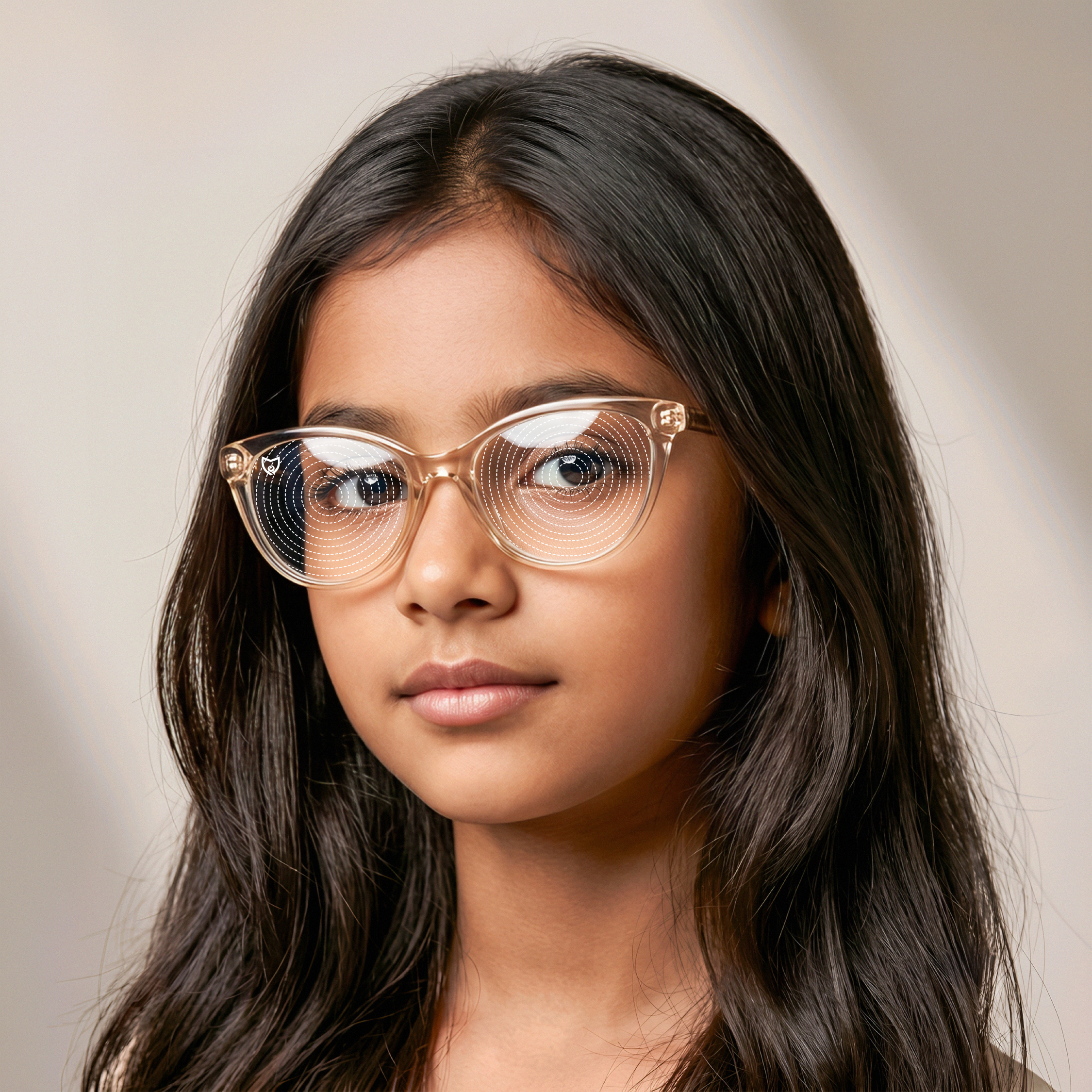 An eye care professional handing eyeglasses with MioShield MyoCare lenses to a young patient